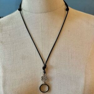 Silver tone  Celtic Knot pendant necklace on black cord